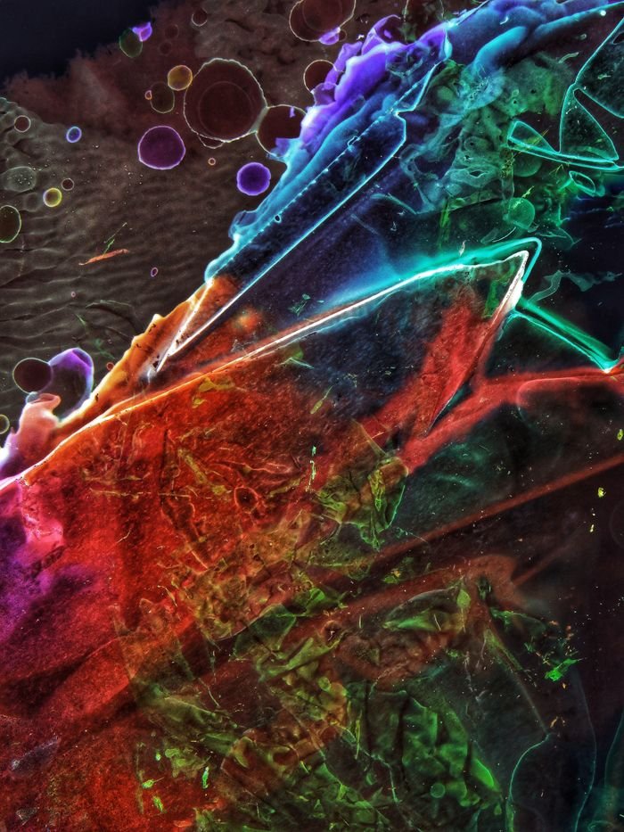 our-services-1 Colorful abstract painting with vivid rainbow shades and intricate textures, perfect for modern art spaces.